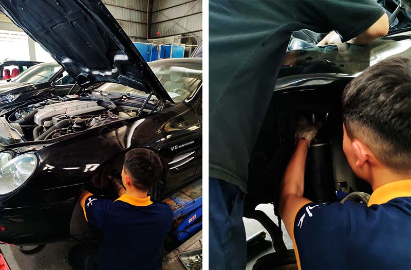 Nhân viên đang bảo dưỡng Mercedes SL - Thay giảm xóc
